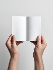 Bifold Brochure Mockup Held by Hand on White
