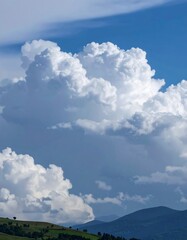 Dramatic clouds over rolling hills