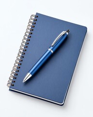 Naklejka premium Blue notebook and pen on white background.