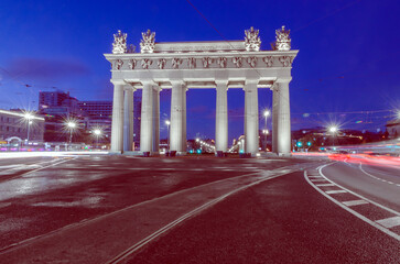 View of the Arc de Triomphe at night.