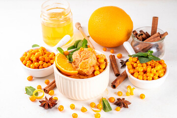 Tasty autumn sea buckthorn ice cream, sweet and sour hippophae gelato or sorbet with orange zest, honey and spices