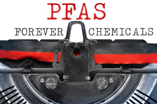 PFAS FOREVER CHEMICALS text concept - Dangerous Perfluoroalkyl and Polyfluoroalkyl substances used in products and materials due to their enhanced water-resistant properties