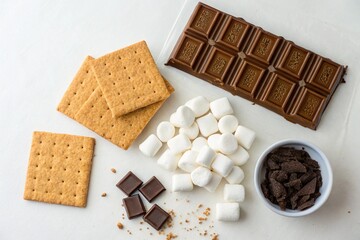 S mores ingredients laid out graham crackers marshmallows and chocolate squares