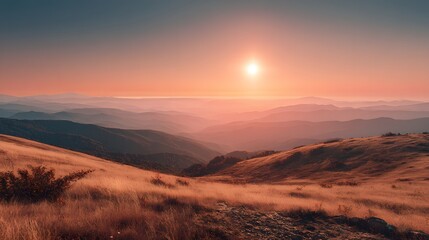 Rolling grassy mountain terrain stretches beneath a vibrant sunlit sky at twilight