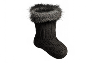 Black knitted warm cozy wool sock with fur cuff for winter apparel, comfort, and fashion on transparent background