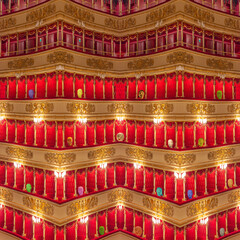 DREAM N°108 – The Theater of Reflections. Surreal and metaphysical artwork depicting a grand opera theater with repeating red velvet balconies and golden decorations