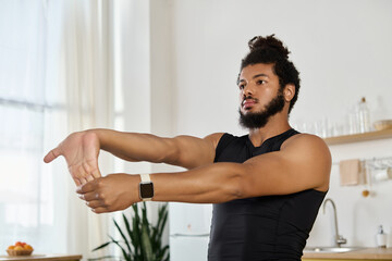 Home workout session of an athletic man focusing on strength and flexibility
