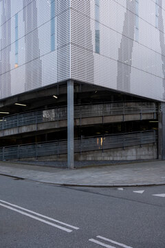 Contemporary european city street view with urban road route perspective, limited traffic and nobody around, featuring balanced mobility and clean modern design