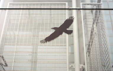 Bird protection sticker on a building with glass facade