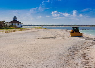 Large Bulldozer Repairing Hurricane Damage on Dune Beach, Gasparilla Island State Park, Florida, USA