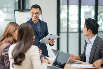 Group of male and female lawyers are giving legal advice in an office.