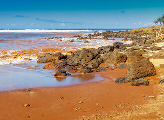 Red Waves Caused By Red Dirt on Dixie Maru Beach, Molokai, Hawaii, USA