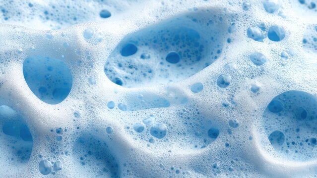 Close-up of blue soap bubbles and frothy foam. Concept Macro shot, Blue soap bubbles, Frothy foam texture, Close-up detail, Bubbles and foam