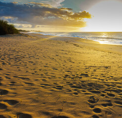 Afternoon Sun Rays on The Sandy Shoreline of Papohaku Beach Molokai, Hawaii, USA