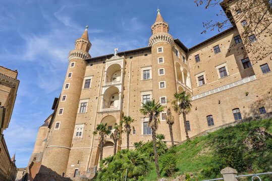 The iconic Renaissance facade of the Palazzo Ducale in Urbino, Italy, with its dramatic twin towers (Torricini).