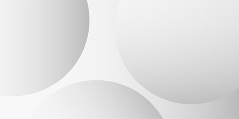 A minimalist abstract background featuring overlapping curves and circular shapes in various shades of gray, creating a smooth gradient and subtle depth