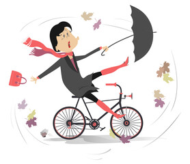 Windy and rainy weather.
Woman with an umbrella rides a bike under strong wind and rain
