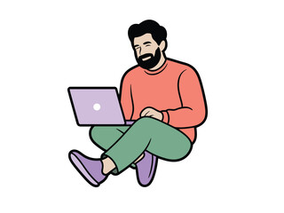 A man with a beard sits cross-legged on the floor using a laptop computer.