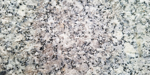 Close Up Textured Background Of Speckled Granite Stone With Light And Dark Grey Flecks