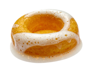 circular beer foam ring with frothy bubbles around golden liquid, macro texture of suds and head, on isolated background