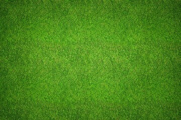 Green grass field background top view texture - aerial of a large patch of some freshly cut, healthy, green grass lawn for sports pitch.