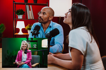 Hosts recording podcast episode in broadcast studio
