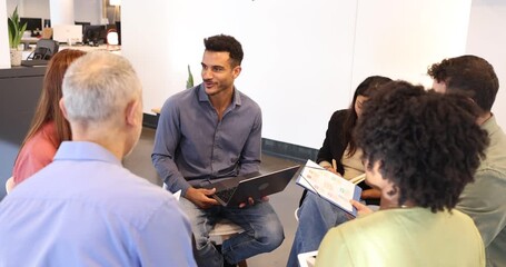 Diverse creative team brainstorming ideas in modern office - Powered by Adobe