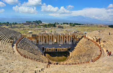 Roman amphitheater in the ruins of Hierapolis, Pamukkale, Turkey. in Turkey. Popular tourist destination in Turkey, UNESCO world heritage.
