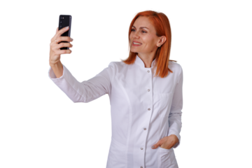 Woman doctor taking a selfie with a smartphone, smiling health professional recording video content for social media