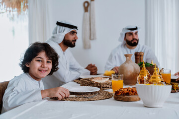 Emirati muslim family dining together during ramadan