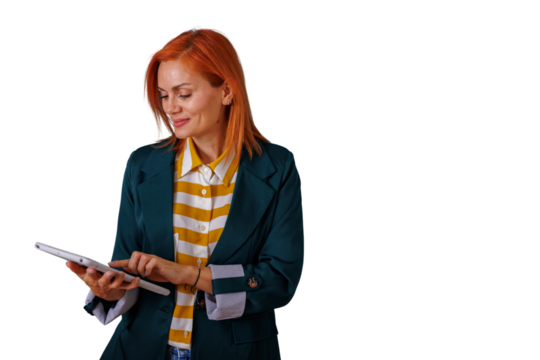 Redhead woman interacting with a digital tablet, demonstrating modern business communication and technology use