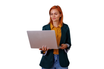 Businesswoman with red hair holding an open laptop, looking at the screen and working. Isolated on transparent background