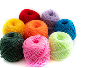  soft colorful woolen yarns on white background