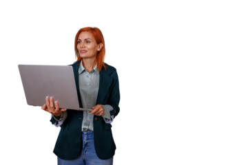 Mature businesswoman with red hair smiling, holding laptop, digital technology, remote work, transparent background