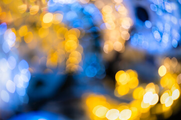 Blue and yellow bokeh lights abstract background