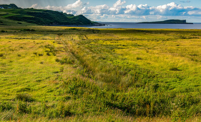 Isle of Skye, Scotland, Uk: aerial and panoramic view of the northeastern coast, with view of the small island Eilean Flodigarry in front of the township of Flodigarry, Trotternish Peninsula
