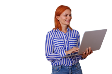 Redhead woman finding success with technology, smiling while working on a laptop, using mobile computing
