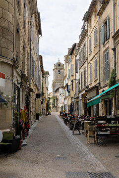 Fototapeta City center with historic streets, cafes and shops in Arles, France, Provence-Alpes-Cote d'Azur region