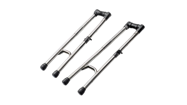 A pair of durable silver crutches featuring rubber tips for stability on a transparent background.