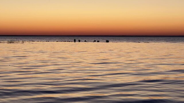 Sunrise at sea. A tranquil atmosphere.