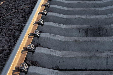 Railway tracks at sunset. New infrastructure for train traffic