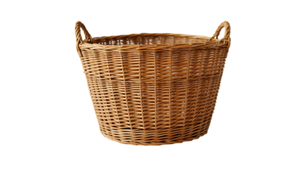 Empty wicker basket near flowers