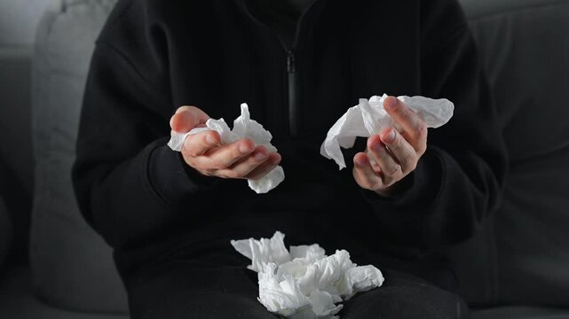 A close-up of wrinkled paper napkins.
A person used the paper napkins and scattered them around the room.
Paper trash in the office