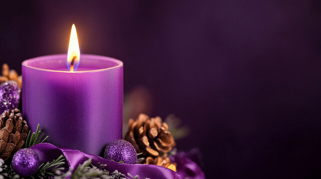 
Close-up of purple Advent candle with ribbon decoration.Space for text.