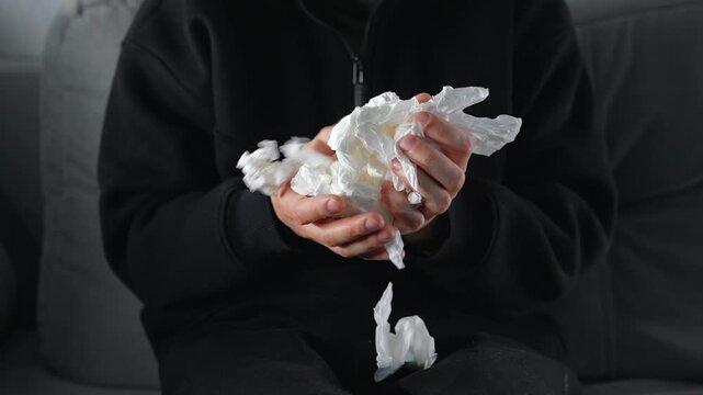 Lots of crumpled paper napkins.
Paper trash and office waste.
Used paper napkins scattered around the room.