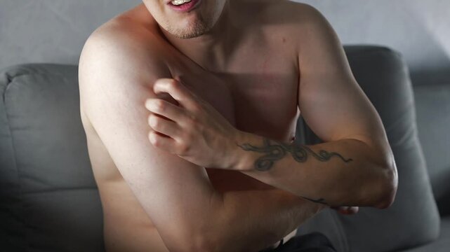 Skin infection and itching of the body.
A man with diabetes scratches his skin and suffers from painful sensations.