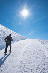 hikers on the prepared winter hiking trail at Nebelhorn mountain, oberstdorf