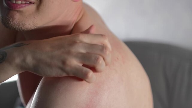 A guy sitting on the couch in his room had itchy skin and problems with his code.