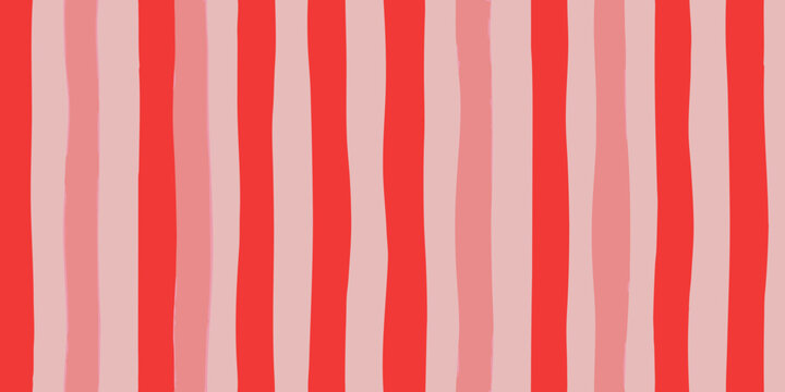 Hand drawn vertical stripes pattern in bright red and soft pink colors