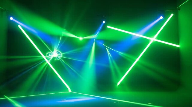 Dynamic stage lighting with intersecting beams of blue and green light creating a dramatic atmosphere on a dark background